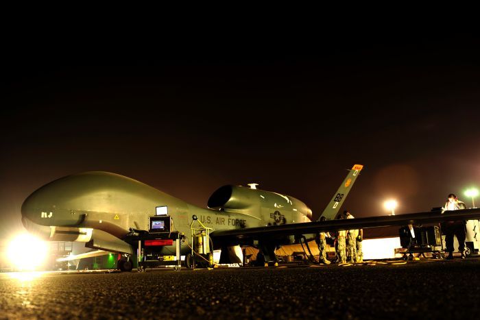 Personnel prepare Global Hawk spy drone A Global Hawk spy drone is prepared for a night mission at an undisclosed location in the Middle East.